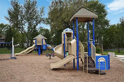 a playground with slides and a slide