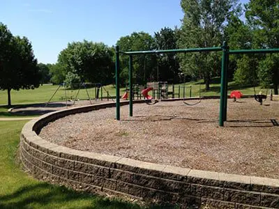 a playground with swings and swings