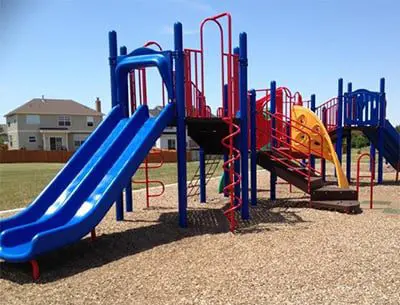 a playground with slides and stairs