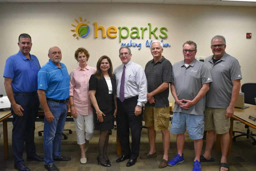 a group of people posing for a photo