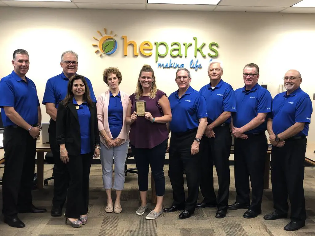 a group of people posing for a photo