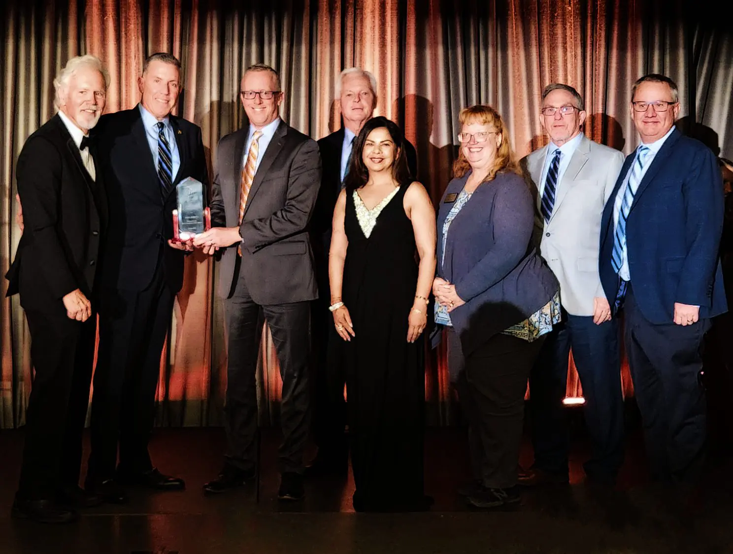 a group of people posing for a photo