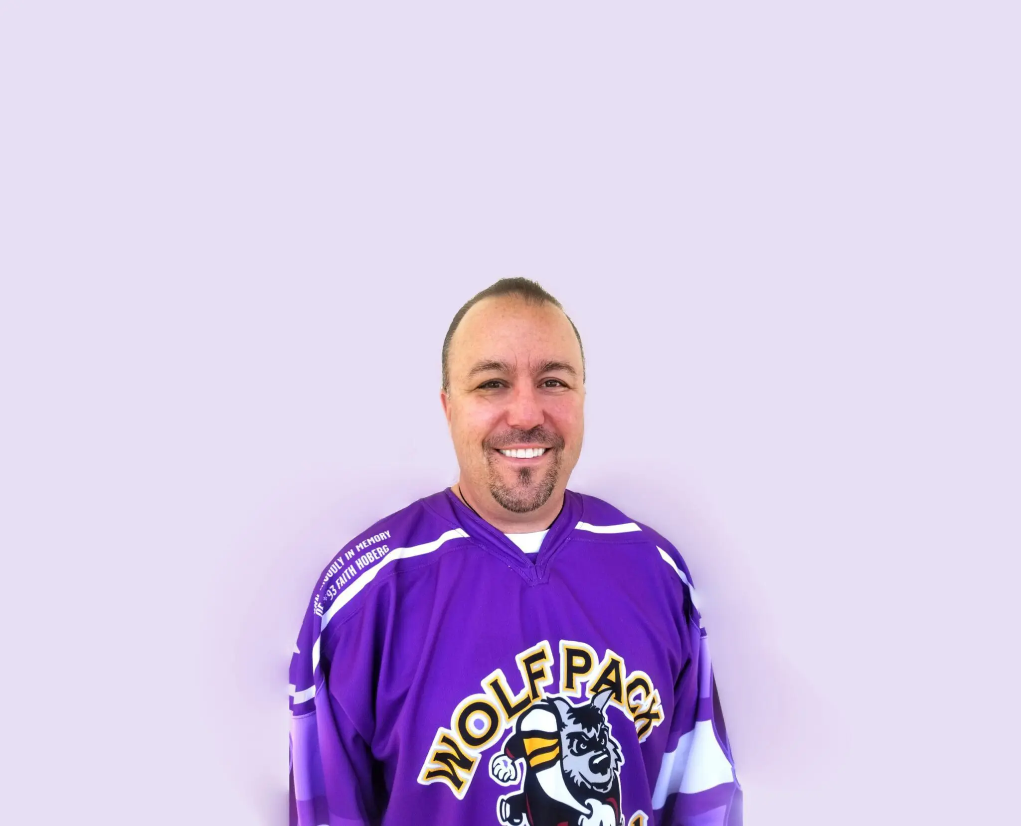 a person in a purple jersey