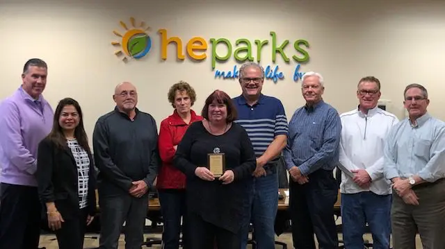 a group of people posing for a photo