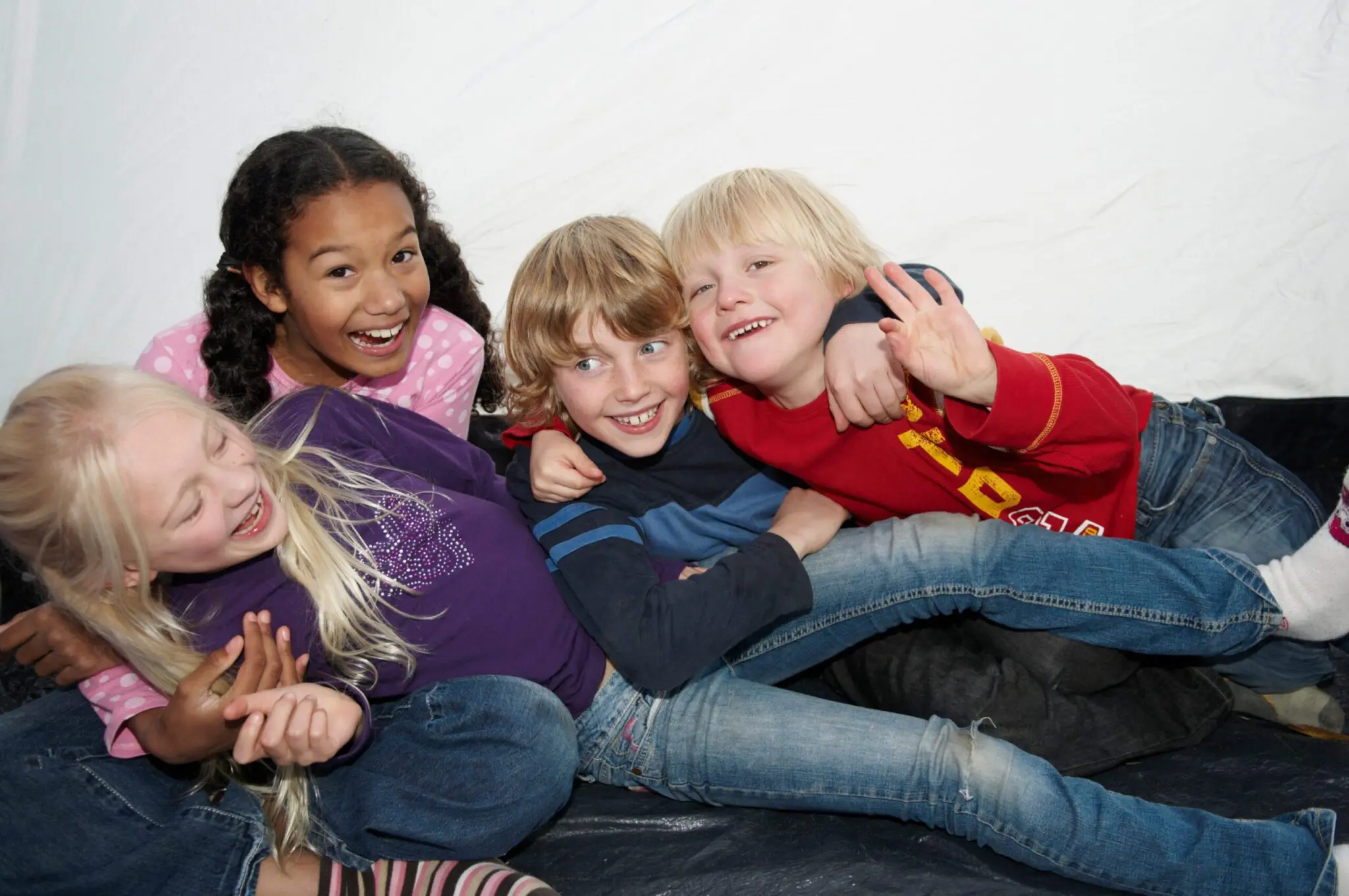 a group of children smiling