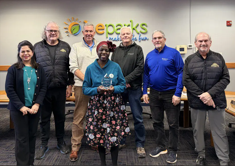 a group of people posing for a photo