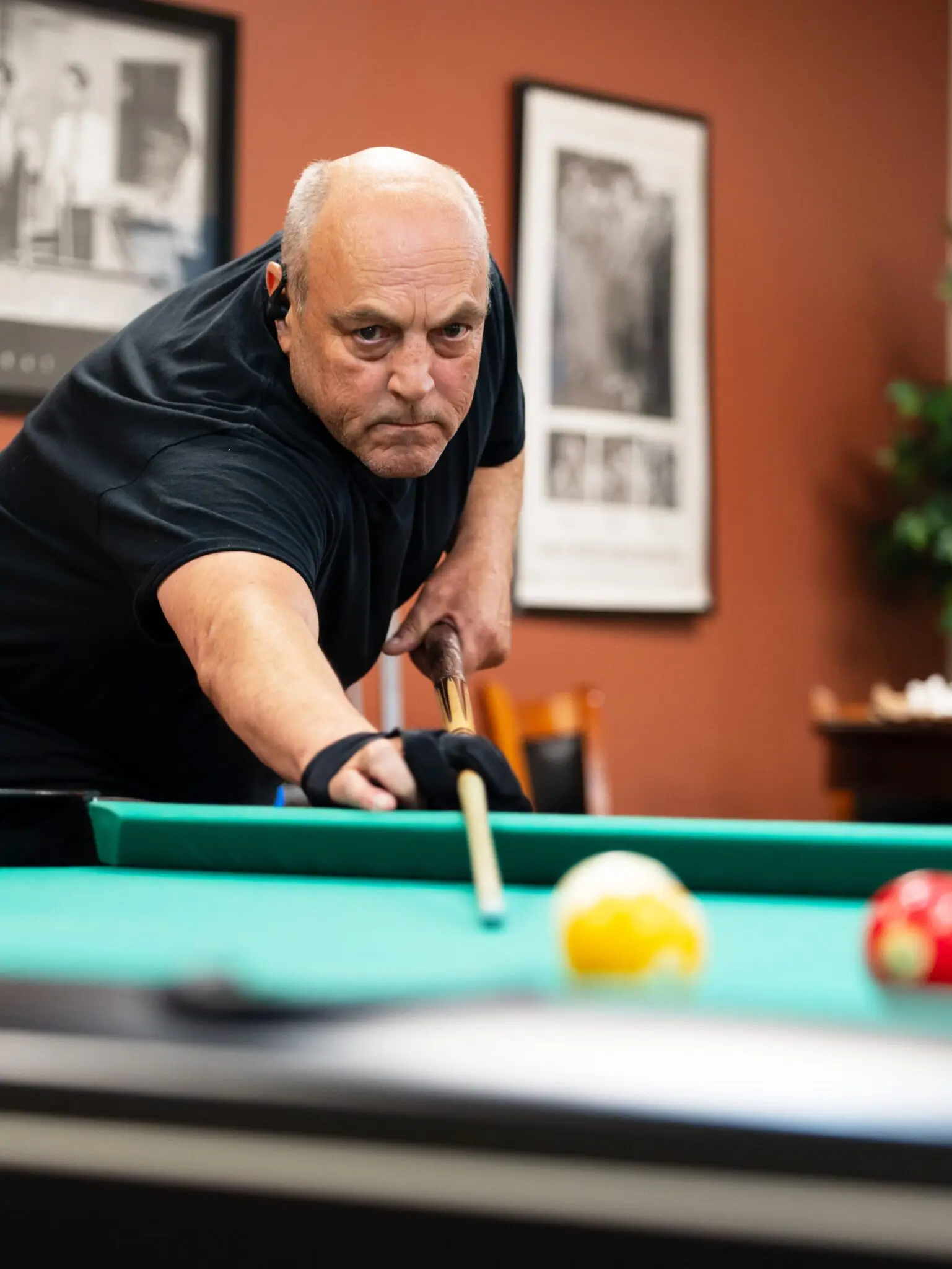 man playing billiards