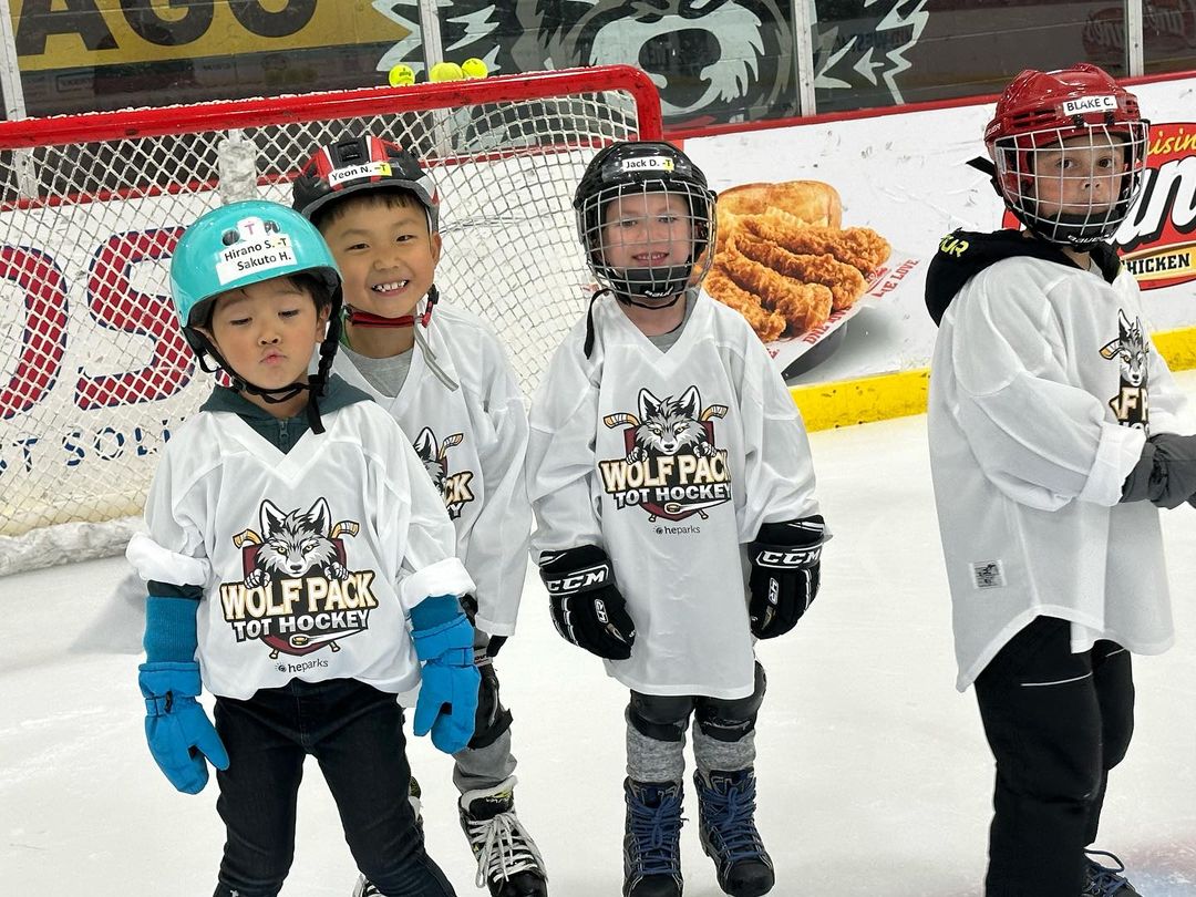 Young new hockey players on the ice