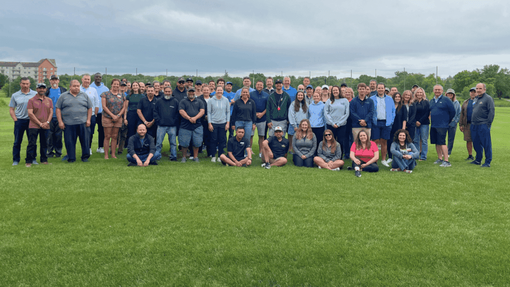group staff photo at Toptracer Range